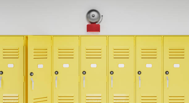 school bell above lockers school bell above a row of yellow lockers. concept of education and back to school. 3d render bell stock pictures, royalty-free photos & images