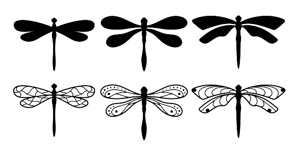 Set of dragonflies silhouettes. Simple vector isolated.