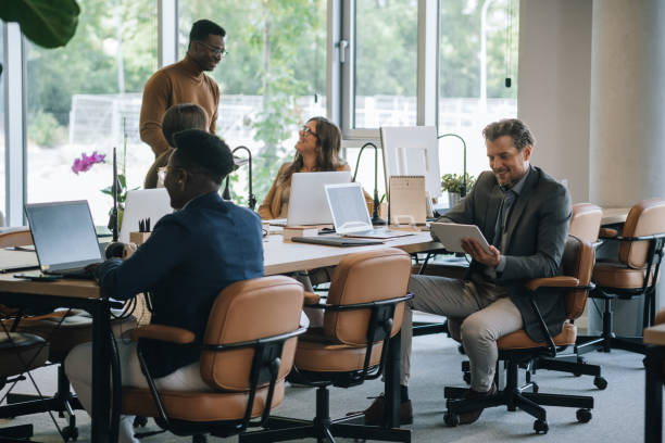istock Mixed-Race Team Working in Open Plan Business Space Office 1331933899