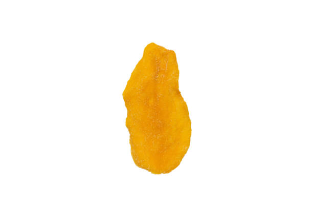 istock Dry tasty mango slices isolated on a white background. 1331934977
