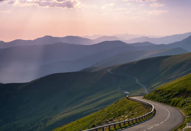 Road passing through the Pyrenees at the top of Larrau. Road passing through the Pyrenees at the top of Larrau. pirineos stock pictures, royalty-free photos & images