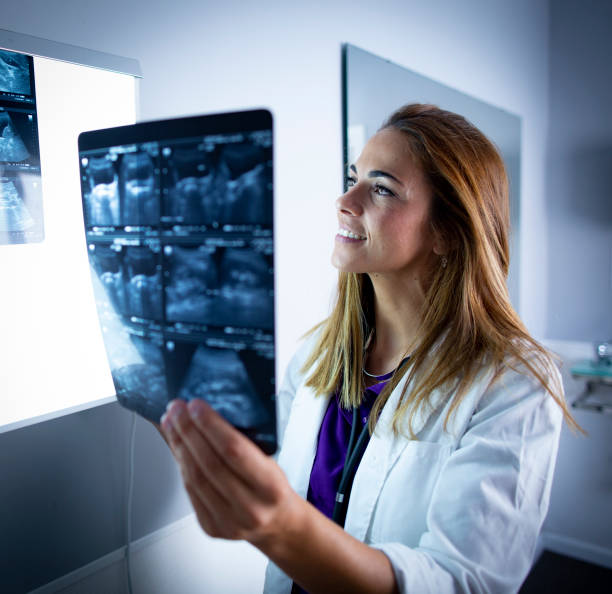 istock Doctor examining X-rays and scans 1331937696