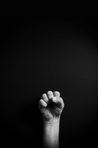 istock B&W image of hand demonstrating ASL sign language letter S with empty copy space 1331940278