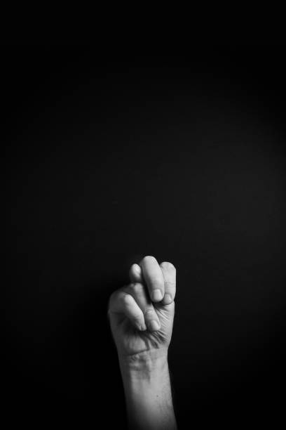 istock B&W image of hand demonstrating ASL sign language letter N with empty copy space 1331940283