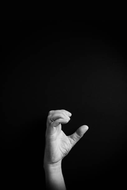 istock B&W image of hand demonstrating ASL sign language letter C with empty copy space 1331940449