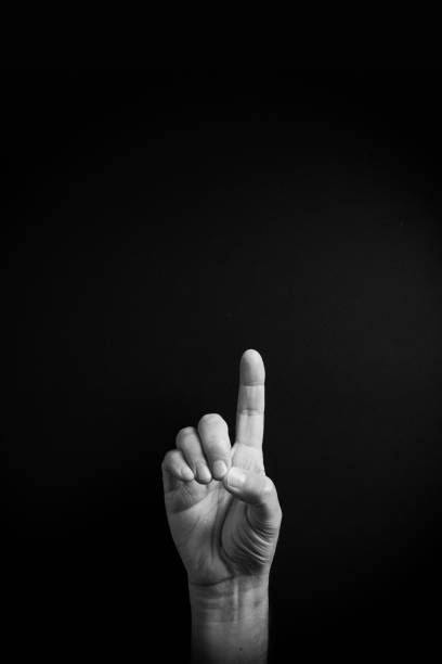 istock B&W image of hand demonstrating ASL sign language letter D with empty copy space 1331940454