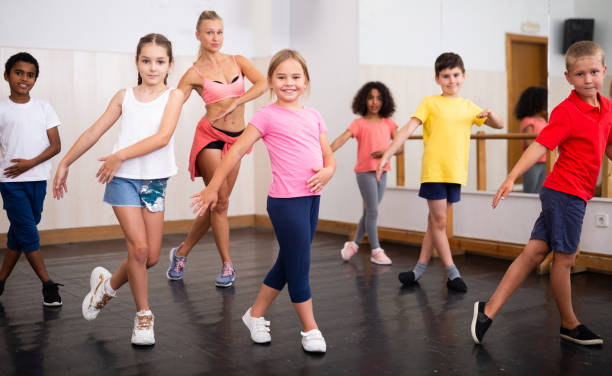 istock Boys and girls training in dance studio 1331943725