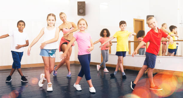 istock Boys and girls training in dance studio 1331943739