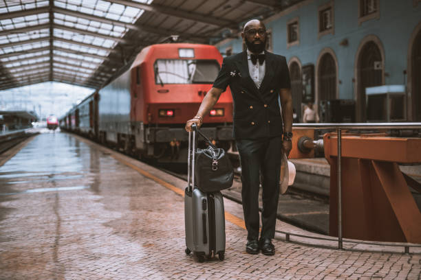 istock A black guy at the railroad station 1331943917