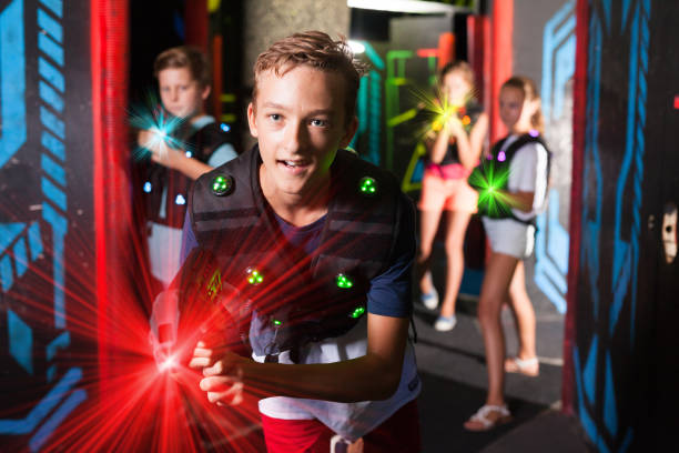 istock Boy having fun on lasertag arena 1331946368