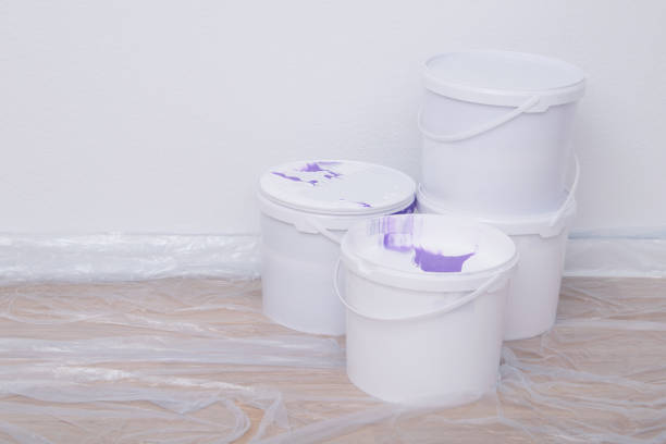 istock close-up of paint buckets against a white wall 1331947100