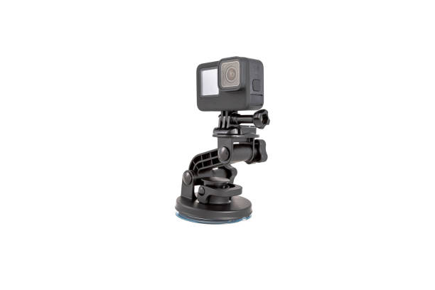 istock New 4K action camera on a suction mount in black color. Isolated white background 1331951465