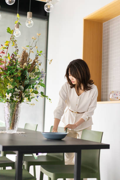 istock Young woman working in a restaurant 1331951816