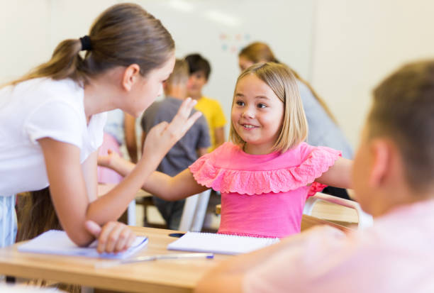 istock Schoolchildren performing team tasks 1331951863
