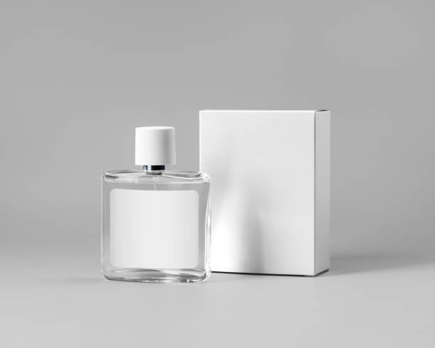 istock Mockup glass transparent bottle with label, perfume container, white cardboard box for design, isolated on gray background. 1331953224