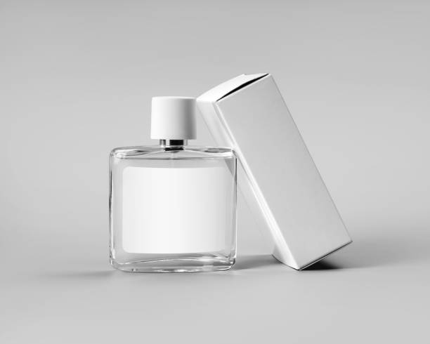 istock Mockup glass transparent bottle with label, perfume container, white cardboard box for design, isolated on gray background. 1331953243