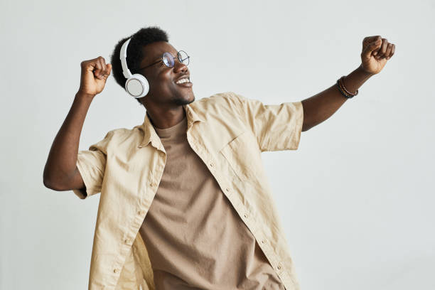 istock Man in headphones dancing 1331956765