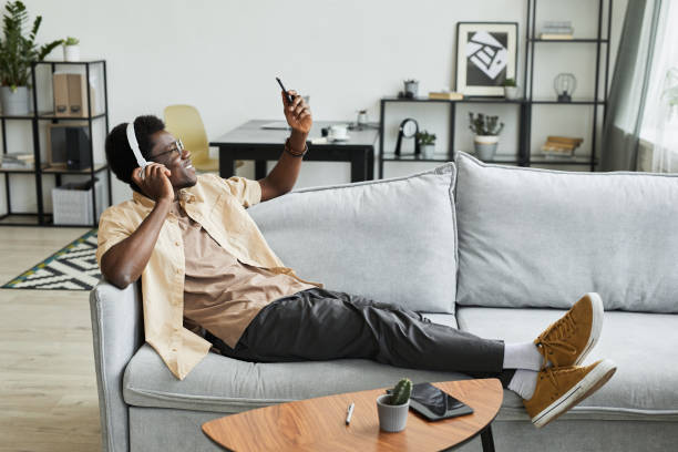 istock Man resting on the sofa at home 1331956771