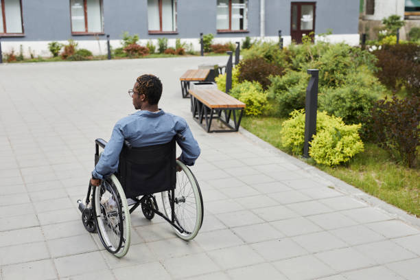 istock Disabled man on street 1331957195