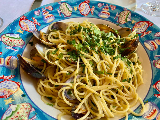 istock Cooked Grooved Carpet Shell Seafood Spaghetti with Mussels. 1331958905