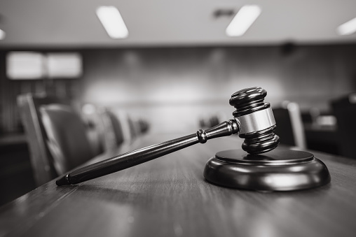 Wooden court gavel on wood table in courtroom,judge and trial. Auction. Law and Justice, Legality concept, Judge.