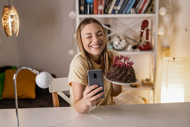 istock Wishing a birthday wish and taking selfie 1331961324