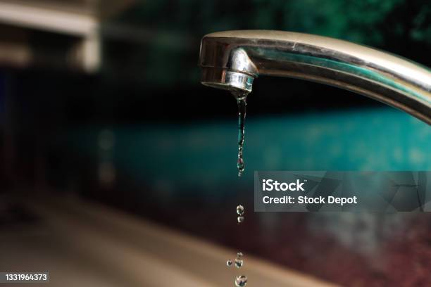 Slow Motion Flowing Water And Water Droplets And Closeup Tap Water Shortage Dont Waste Water And Food Stock Photo - Download Image Now
