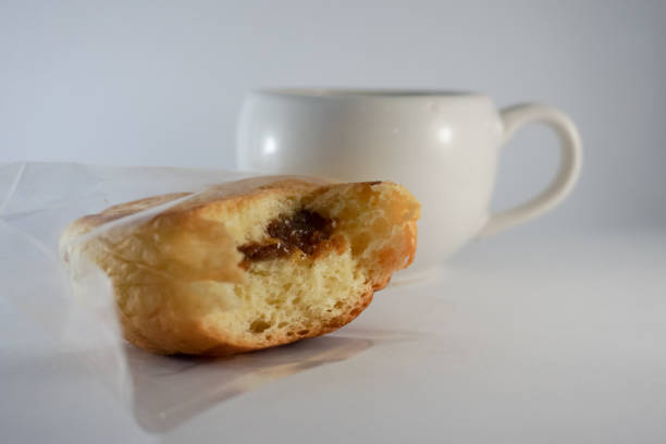 istock Slice of chocolate stuffed bread with a white mug 1331964421