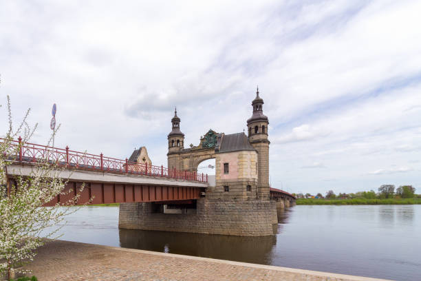 Sovetsk, Kaliningrad Region, Russia (until 1946 - Tilsit, East Prussia, Germany) - May 09, 2021: Queen Louise Bridge on the Neman River. Border crossing Russia-Lithuania during the coronavirus pandemic.