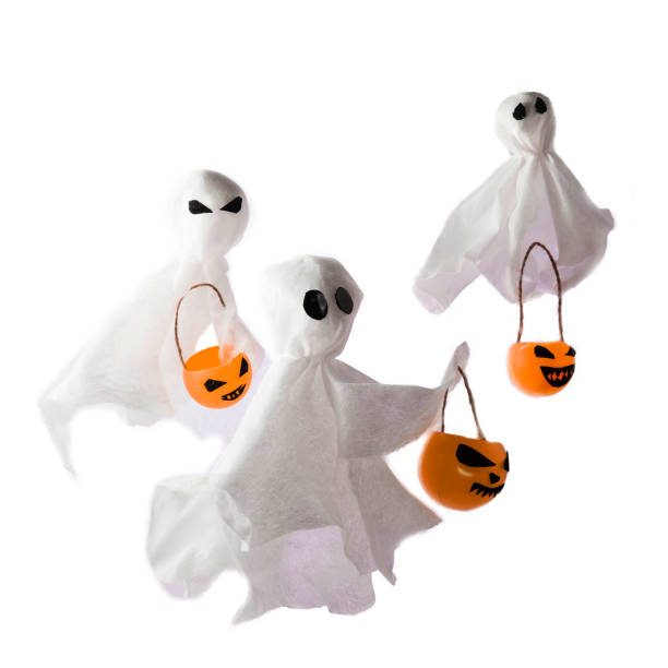 istock Decorative background for Halloween, white ghosts with pumpkins 1331964800