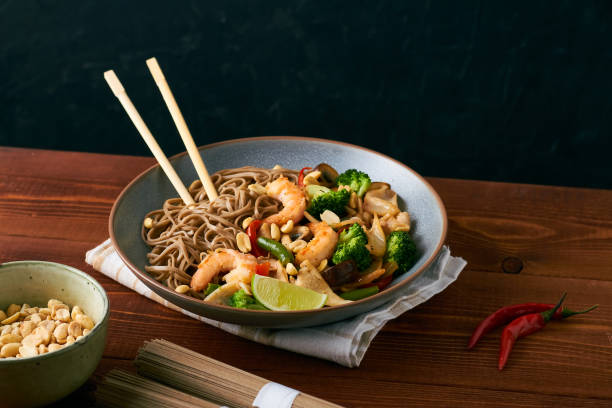 istock asian noodles with shrimps squid vegetables 1331966373