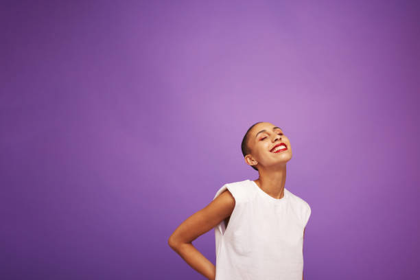 istock Beautiful woman model on purple background 1331969341