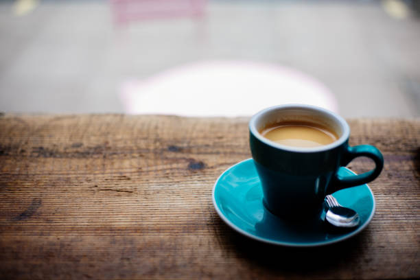istock Coffee cup on the wooden table 1331970828