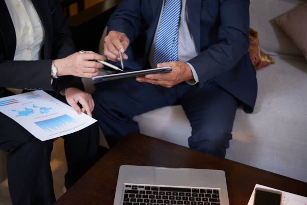 istock Business Partners Discussing Report 1331970851