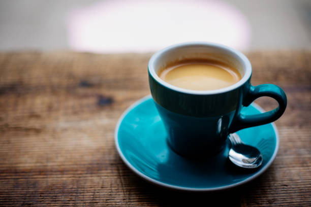 istock Coffee cup on the wooden table 1331970928