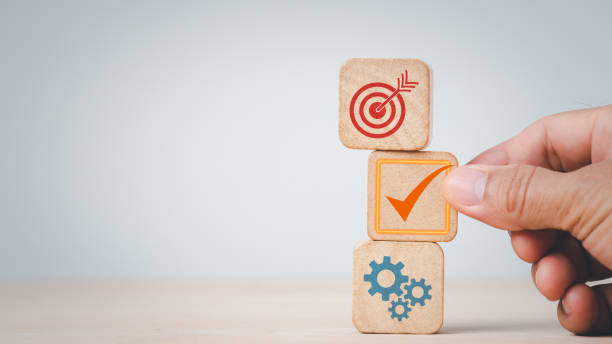 istock hand stack woods block step on table with icon Action plan, Goal and target, success and business target concept, project management, company strategy development. 1331971328