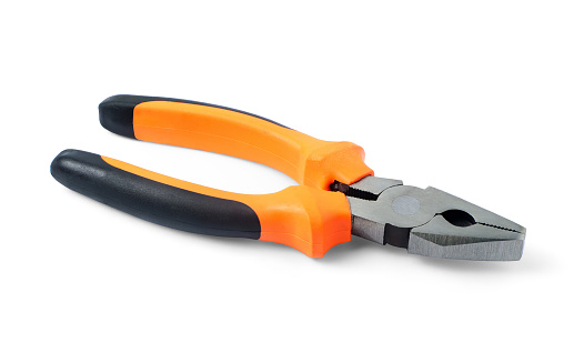 Close up new metal pliers, orange and black rubber grip. Used for bending, cutting, clamping in electrical work. Repair or build. Isolated on white background. with clipping path.