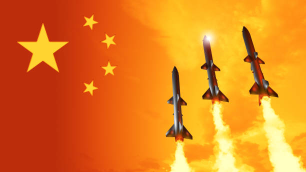 istock China flag with missiles. China nuclear missile attack. 1331973780