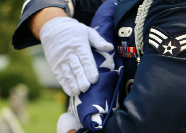 istock US Air Force Honor Guardsman carrying folded American flag 1331974830