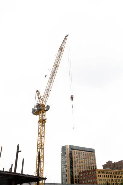 Large Crane working on construction project in city