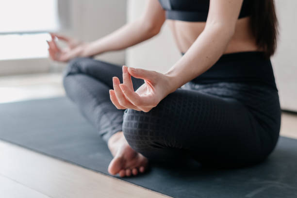 istock Woman in lotus pose making mudra gesture 1331978358