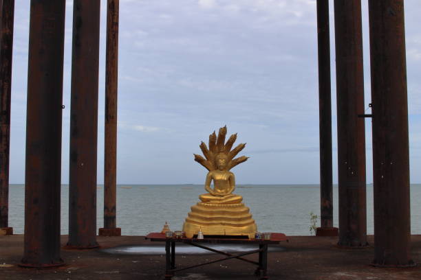 istock A never finished and abandoned Thai temple with a golden Buddha statue 1331981083