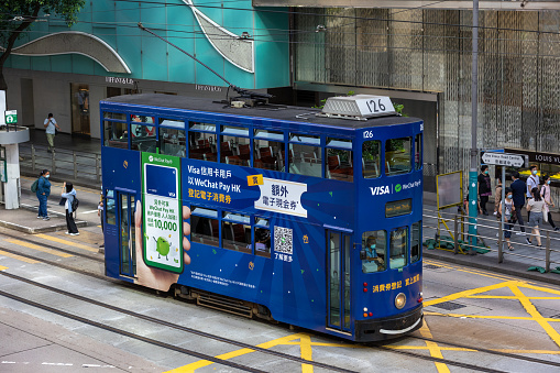 Hong Kong - August 2, 2021 : Double-decker tram at Central in Hong Kong. Hong Kong has the world's largest operating fleet of double-decker trams.