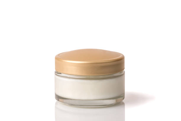 istock Cosmetic cream in a white jar. On a white isolated background. 1331983976