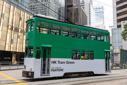 Hong Kong - August 2, 2021 : Air-conditioned double-decker tram at Central in Hong Kong. It is first commuter tram with air-conditioning installed in Hong Kong.