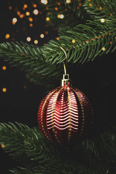 istock Festive Christmas concept with glowing red colored bauble. 1331986625