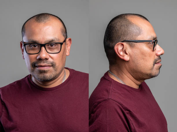 istock Smiling hispanic mature man front and profile mugshots 1331987878