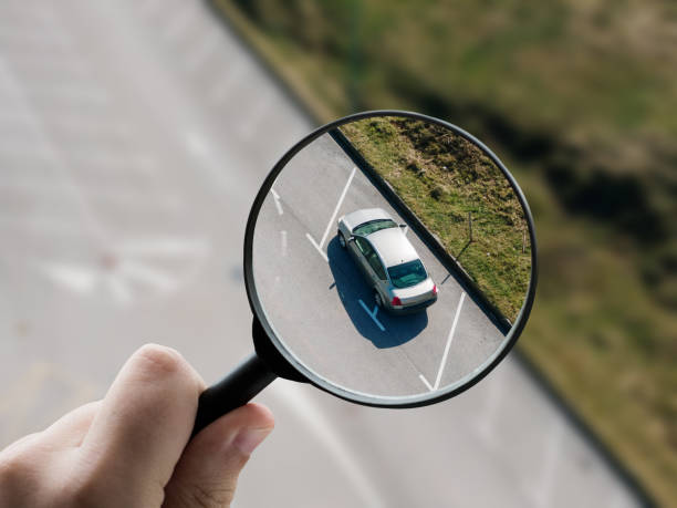 istock Magnifying glass focusing on a car 1331988751