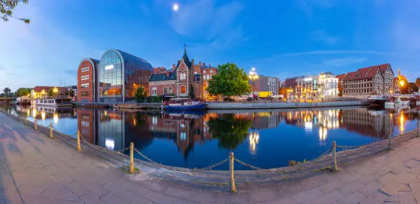 Panorama of the city embankment and the river at sunrise. Bydgoszcz. Poland.