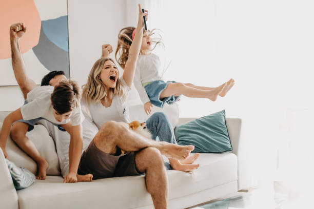 istock family celebrating a goal 1331989703